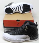 A pair of as new Nike Air Jordan 12 Retro (UK 9.5).