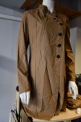 An as new Lurdes Bergada Coated button jacket (L - RRP £179).