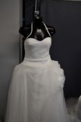 An as new Vera Wang Bride Alizee Princess wedding dress with open back (UK 14 - RRP £2800).