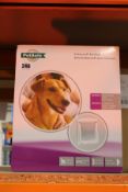 Four boxed as new PetSafe Staywell Medium Model 2-Way Pet Doors.