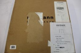 A boxed as new Normann Copenhagen Tap Stool in Caramel/Walnut.