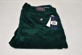 A pair of as new Ralph Lauren cord pants in green (W36/L34).