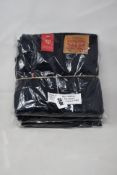 Four pairs of as new Levi's 511 slim jeans (W38/L30).