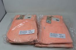 Four pairs of as new Levi's jeans in peach (W24/L30, W26/L30, 2 x W28/L30).
