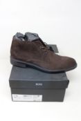 A pair of as new Hugo Boss Firstclass desert boots (UK 9).