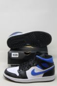A pair of as new Nike Air Jordan 1 Mid (UK 7).