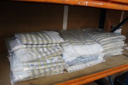 A large quantity of as new Roliku Tablecloths (Approximately 35, various sizes).