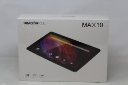 A boxed as new DragonTouch Max10 android tablet.