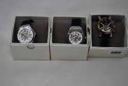 Three men's as new Vault automatic watches.
