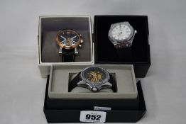 Three men's as new Vault automatic watches.