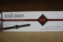 A boxed as new Jose' Eber HST 25mm Clipless Curling Iron.