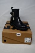 A pair of as new Kurt Geiger Trixie Warm ankle boots (EU 37).