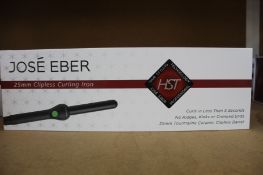 A boxed as new Jose' Eber HST 25mm Clipless Curling Iron.