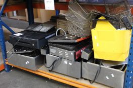 Three pre-owned countertop fryers to include Buffalo, a pre-owned Panini press, a Casio cash