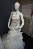 An as new Vera Wang Bride Eliette strapless fit and flare wedding dress with open back (UK 12).