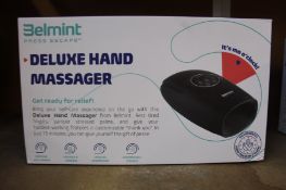 Two boxed as new Belmint Press Escape Deluxe hand massagers.
