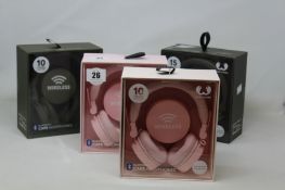 Four boxed Fresh and Rebel caps Bluetooth headphones.