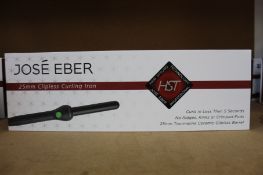 A boxed as new Jose' Eber HST 25mm Clipless Curling Iron.