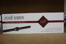 A boxed as new Jose' Eber HST 25mm Clipless Curling Iron.