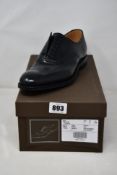 A pair of as new Church's Berlin shoes in black (Size 7).