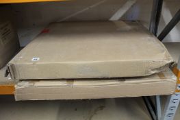 Two round wooden/metal coffee tables.