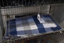 Fifteen as new Edinburgh Cashmere scarves in blue/green square tartan (RRP £48 each).