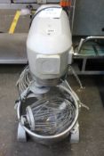 A pre-owned commercial dough mixer with bowl and attachments (Model B20C).