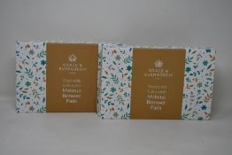 Forty boxed Grace and Evergreen washable and reusable makeup remover pads.