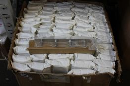 A quantity of stainless steel four hook hanger racks (Approximately 60 items).