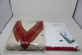 An as new Lascoste polo shirt (FR 6) and a sweater (Size 36).