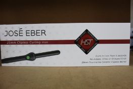 A boxed as new Jose' Eber HST 25mm Clipless Curling Iron.