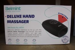 Two boxed as new Belmint Press Escape Deluxe hand massagers.