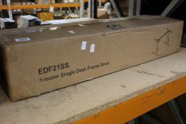 A boxed as new EDF21SS 1-motor single sit-stand desk frame.