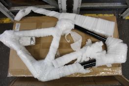 An unbranded light-weight bike frame with forks (NOTE: model and frame size is unknown).