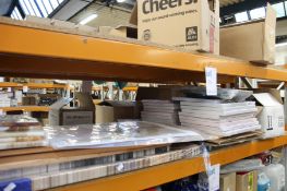 A large quantity of prints, posters, frames and other related items.