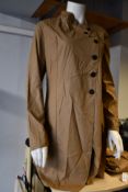 An as new Lurdes Bergada Coated button jacket (M - RRP £179, slight mark on front, requires