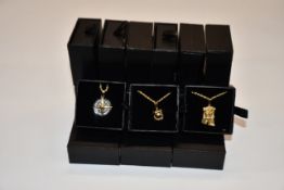 Fifteen items of assorted Haraves jewellery to include 5x Globes, 4x Compass and 6x Jesus.