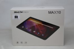 A boxed as new DragonTouch Max10 android tablet.