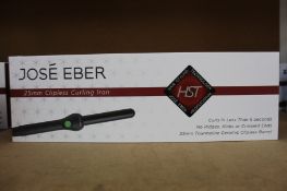 A boxed as new Jose' Eber HST 25mm Clipless Curling Iron (Some minor damage to packaging).