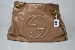A pre-owned Gucci handbag with dust bag and box (Excellent condition).