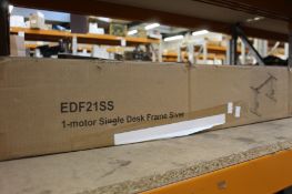 A boxed as new EDF21SS 1-motor single sit-stand desk frame.