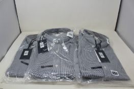 Four as new Tommy Hilfiger Core striped shirts (XL).