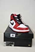 A pair of as new Nike Air Jordan 1 Mid (UK 10.5).