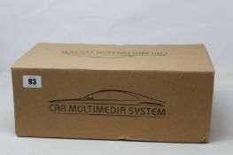 A boxed as new Car Multimedia System car radio media player, 1025-14 E87 I-Drive 07-12Y.