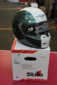 A Stilo ST5F N Composite Helmet in green and white with Aston Martin logo (57).