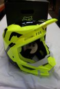 A boxed as new Fox Racing V1 Skew Helmet in fluorescent yellow (Small).