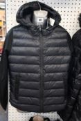 An as new Ralph Lauren multi-panel padded jacket (XL).