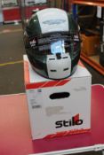 A Stilo ST5F N Composite Helmet in green and white with Aston Martin logo (57).