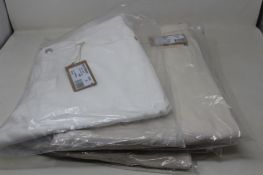 Four pairs of as new A.P.C. white jeans (2 x 30, 1 x 31, 1 x 34).