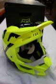 A boxed as new Fox Racing V1 Skew Helmet in fluorescent yellow (Medium).